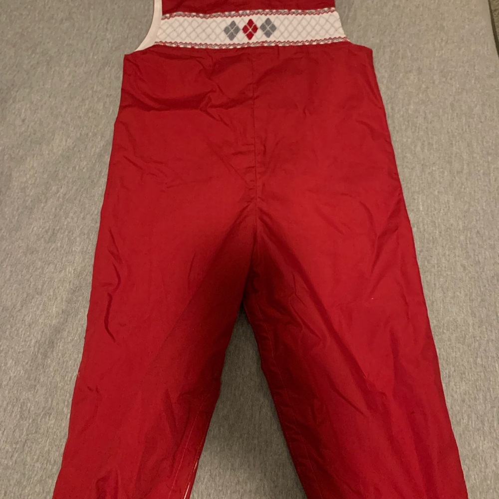 Boys long all. I have two.optional back button dress shirt underneath.